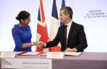 French Interior Minister Gerald Darmanin (R) and Britain's Home Secretary Suella Braverman (L) shake hands after signing a joint declaration signature at the Hotel Beauvau Interior Ministry in Paris, on November 14, 2022. - France and the UK signed a new agreement to work together to stop migrants crossing the Channel to England in small boats, a source of huge bilateral tension.
The deal, signed in Paris by French Interior Minister Gerald Darmanin and British counterpart Suella Braverman, will see Britain pay France 72.2 million euros ($74.5 million) in 2022-2023 so that French authorities can increase by 40 percent the numbers of its security forces patrolling French northern beaches, the French interior ministry said. (Photo by Thomas SAMSON / POOL / AFP)
